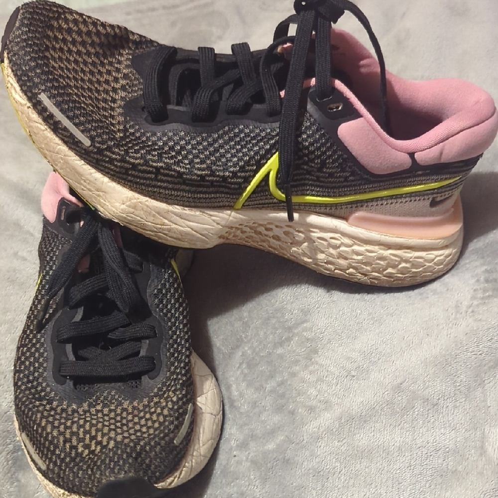 Nike Black and Pink Athletic Shoes with Cushioned Midsoles